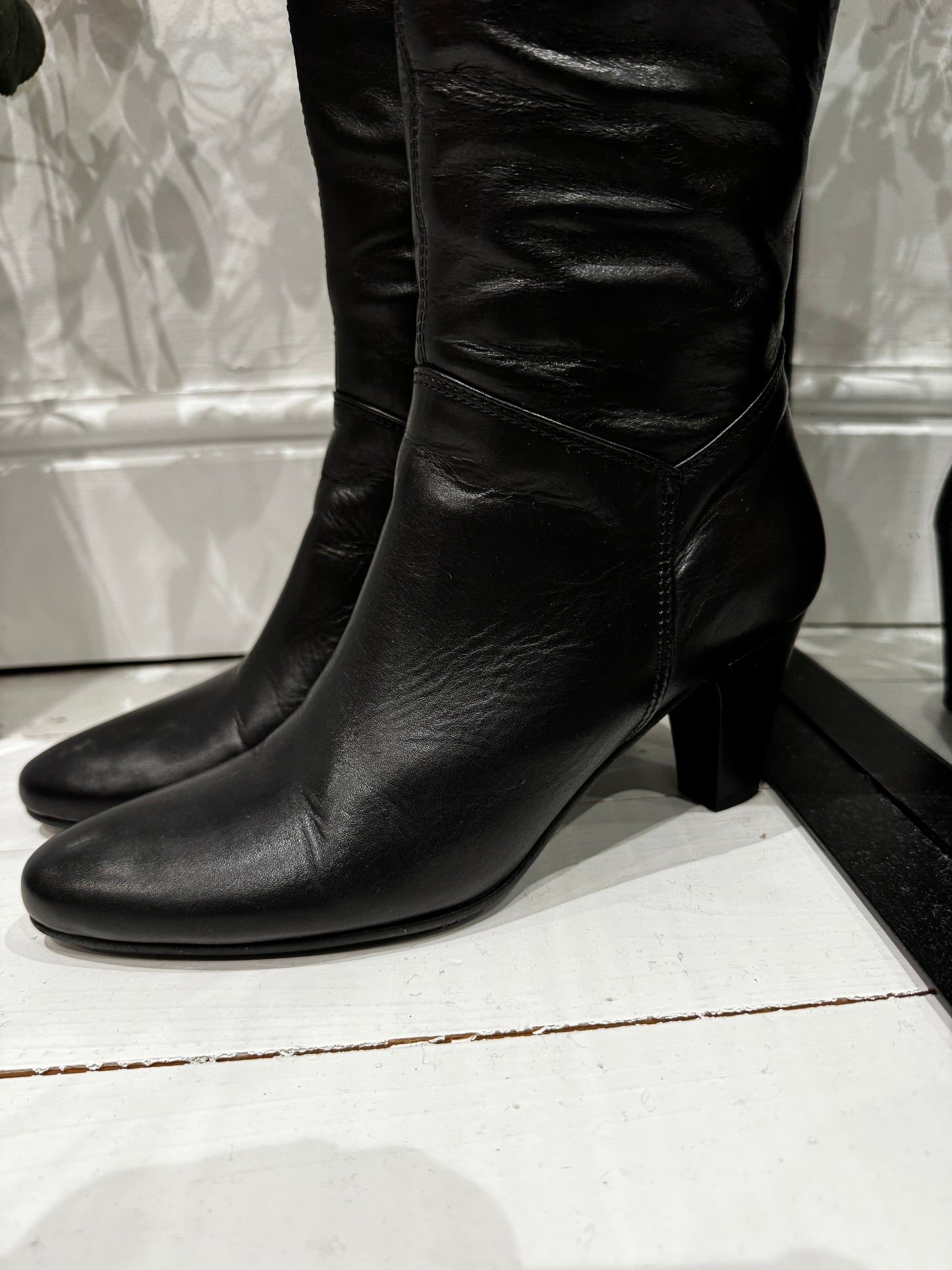 Leather knee high boots