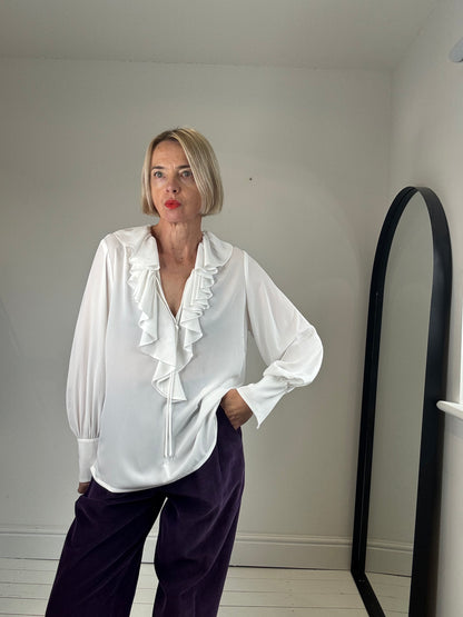 Ruffle tie blouse