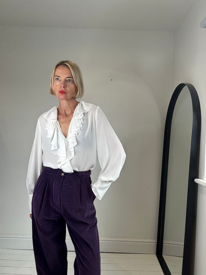 Ruffle tie blouse