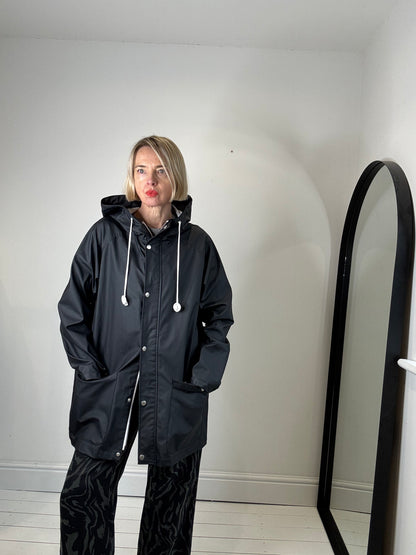 rubber rain mac with hood popper and zips size large women's preloved BDG Urban oUTFITTERS